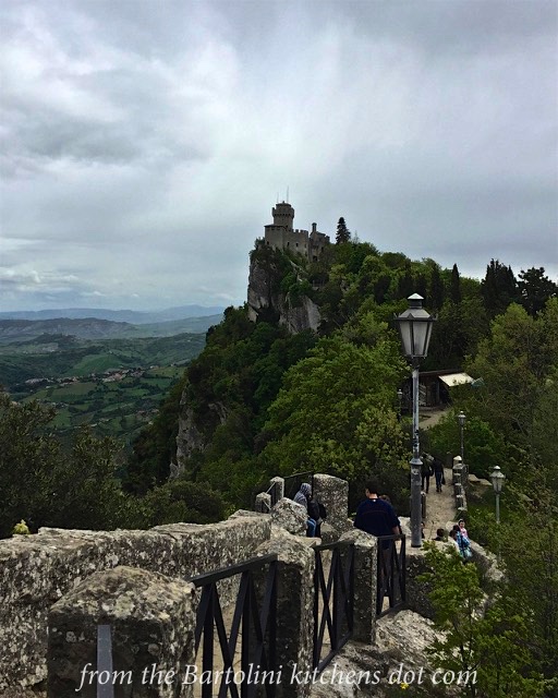 Walking along the wall to another tower of San Marino